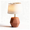 Geometric terracotta table lamp with cream fabric shade 30 x 30 x 45cm